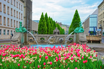 Golem monument and Kronthal fountain at Marcinkowski Avenue Poznan - obrazy, fototapety, plakaty