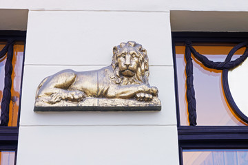 Lion Statue as decoration on building in Poznan