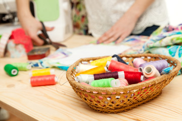 cutting a detail of a product on fabric