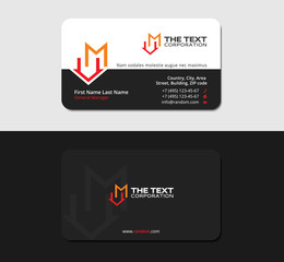 black business card with letter M and home symbol