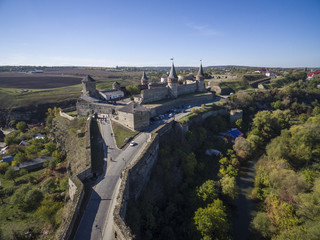 Aerial shot of Kamianets-Podilski castle in Western Ukraine. Taken on a bright clear autumn day with blue skies