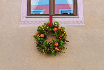 Fototapeta na wymiar Wreath decorated for Christmas in Garmisch Partenkirchen