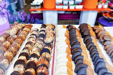 Glass shop window with handmade pastry