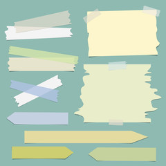 Multiple pieces of colorful sticky tape, arrow shaped paper strips and notepaper on color background - 143285083