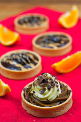 tartlets, basket cakes, sweet, tea on the wodden table