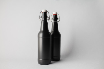 Two beer bottles on the scene, mock-up.