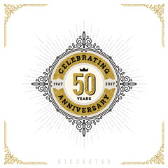 Naklejka premium Vintage Anniversary logo emblem with flourishes calligraphic ornamental elements.- vector illustration
