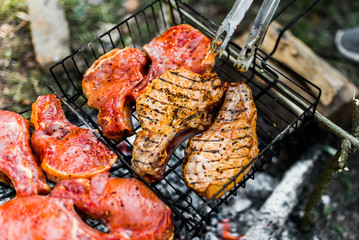 Flames on a Barbecue grill with lot of charcoal