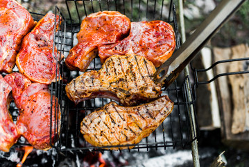 Flames on a Barbecue grill with lot of charcoal