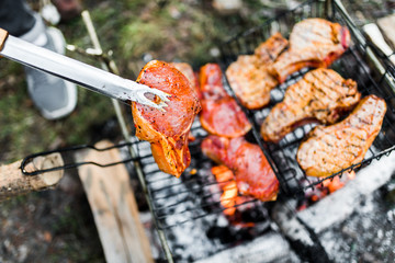 Flames on a Barbecue grill with lot of charcoal