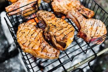 Flames on a Barbecue grill with lot of charcoal