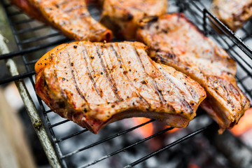 Flames on a Barbecue grill with lot of charcoal