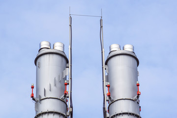 industrial boiler flues, against the blue sky