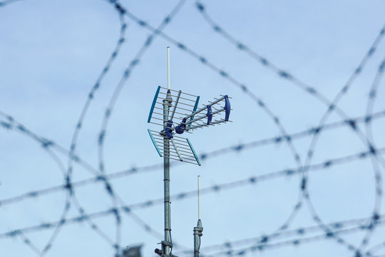 Directional antenna for reception of digital television broadcasting DVB-T and DVB-T2 against a blue sky. Selective Focus