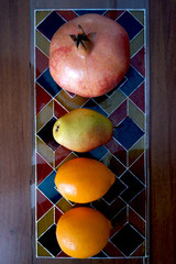 Still-life from fruit on stained glass