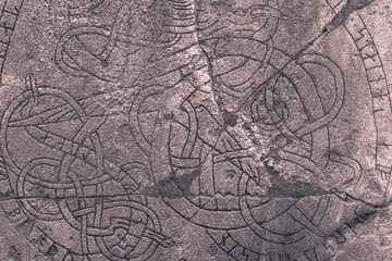 Skanela, Sweden - April 1, 2017: Viking runestone in Skanela Church, Sweden