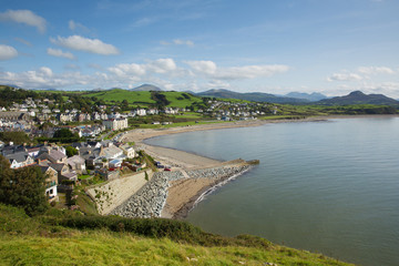 Fototapeta na wymiar Criccieth Wales UK located south of Caernarfon in summer with blue sky on a beautiful day