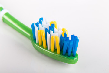 Closeup of toothbrush with uneven round tip bristle