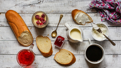  A light breakfast (or snack) - a loaf, yogurt, berries, cheese, jam and other