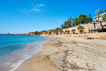 Fototapeta na wymiar Beach of Punta Prima. Southern Spain
