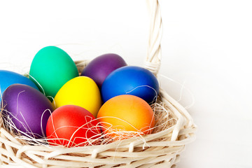 Colored Easter eggs in a basket
