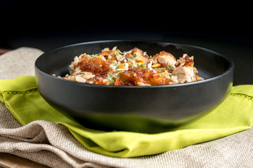 Homemade Chinese fried rice with vegetables and fried eggs