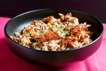 Homemade Chinese fried rice with vegetables and fried eggs