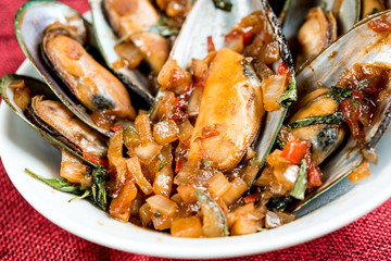 Mussel with white wine sauce on table