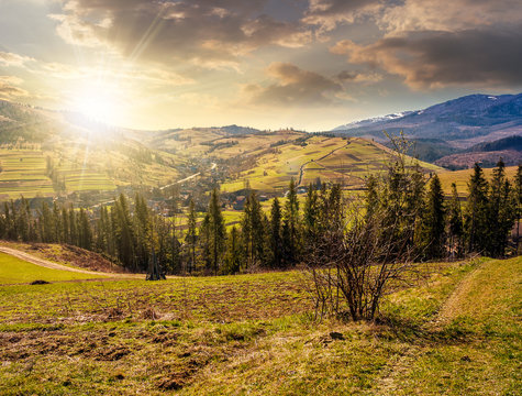 mountain rural area in springtime at sunset
