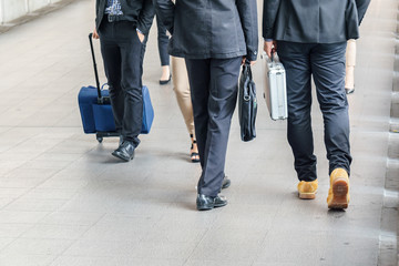 Group of business people walking at street