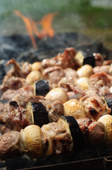 Grilling shashlik on barbecue grill. Selective focus