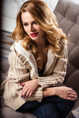 beautiful sexy young woman in a lingerie and warm clothes, casual style. fashion beauty portrait