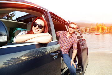 car and two people 