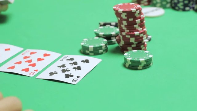 Playing Texas poker at an underground casino