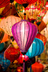 Fototapeta na wymiar Colorful lanterns at the market street of Hoi