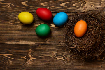 colorful eggs inside nest. Happy Easter concept