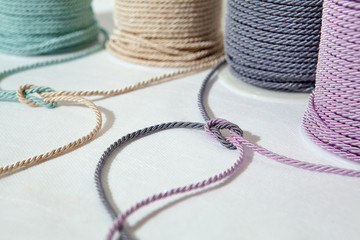 Spools of colourful strings-cords