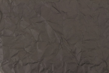 black crumpled paper texture background