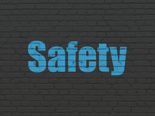 Obraz premium Security concept: Safety on wall background
