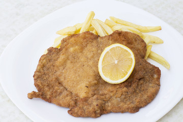 Schnitzell on white plate