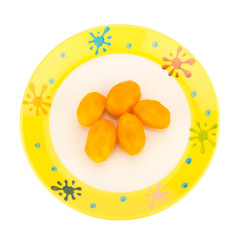 Marian plum in bowl isolated on white background. Mayongchid. Maprang. Marian Plum. Plum Mango