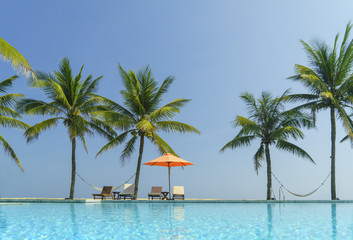 Pool and beach at luxury hotel