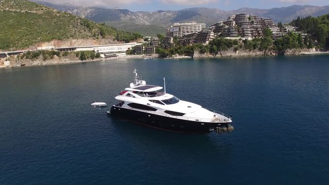 Yacht in the sea, aerial photography drone, Budva, near Dukley Gardens, Adriatic Sea, Montenegro, Balkans