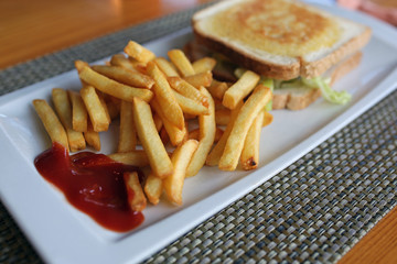 french fries and vegetable sandwich