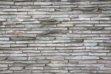 Old color stone block wall texture for background and wallpaper