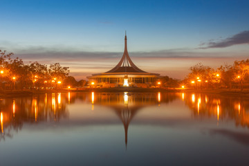 Fototapeta na wymiar Monument in public park of thailand. Twilight shooting reflection on water concept at the Suanluang Rama 9, Thailand