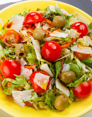 Mixed salad on black slate.