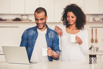 Afro American couple in kitchen