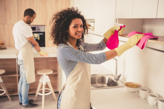 Afro American couple cleaning