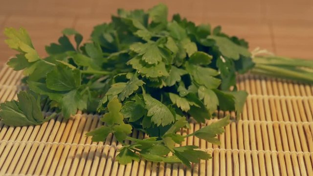 Sliding to fresh lovage in the kitchen ready to be cooked.